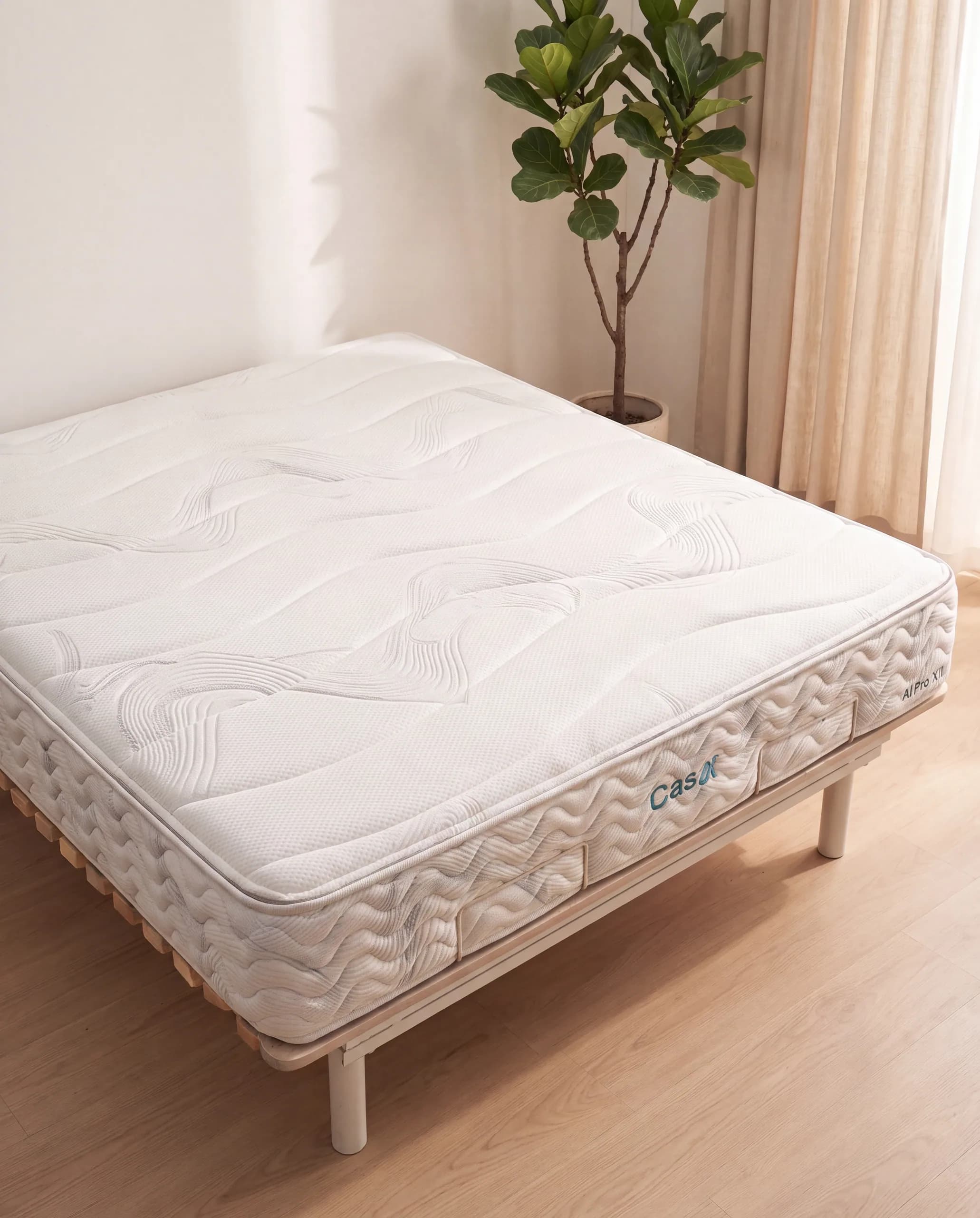 The AI Pro XII mattress from above at an angle, showing the wave quilting across the top.